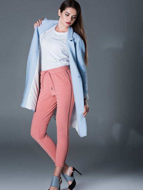lovely girl posing in blue trench coat and pink tr 2024 11 19 06 09 01 utc