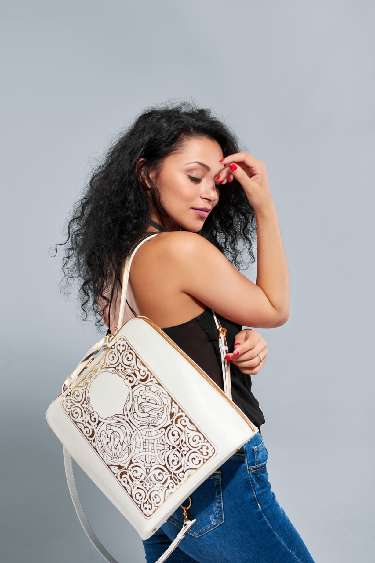 wonderful girl with black curly hair carries white 2025 03 25 03 22 18 utc